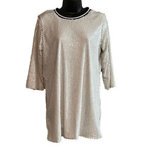 Glamorous sequins of white and a sporty neckline! Size SMALL excellent condition